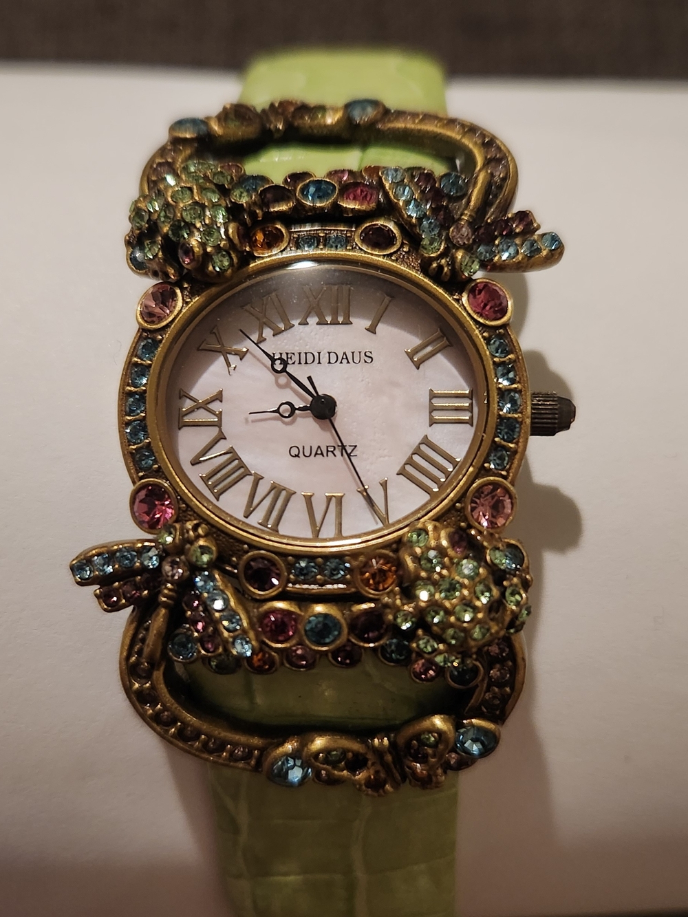 Heidi Daus Gold-Tone Watch with Pale Green Leather Strap